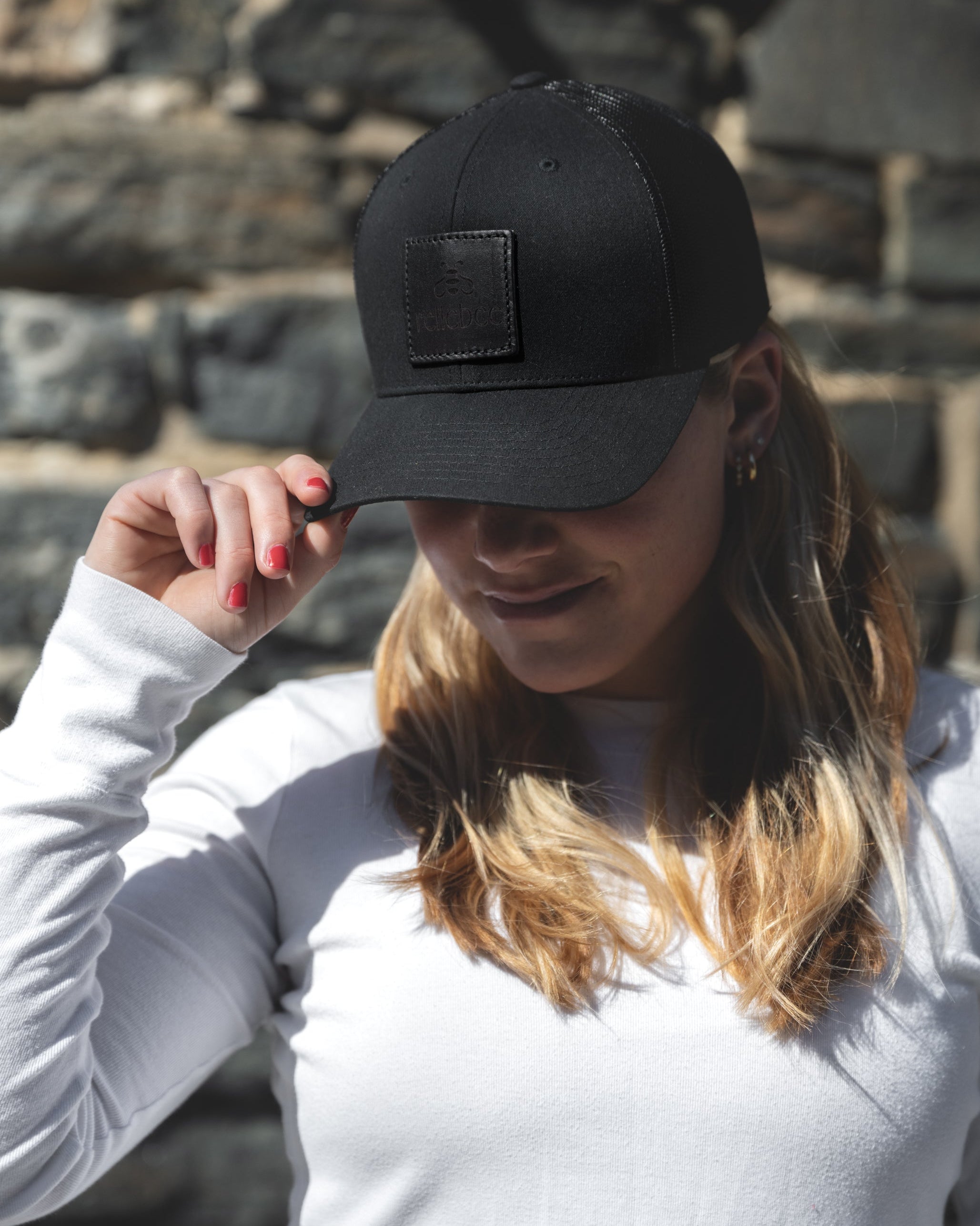 Closeup image of model wearing the Cap