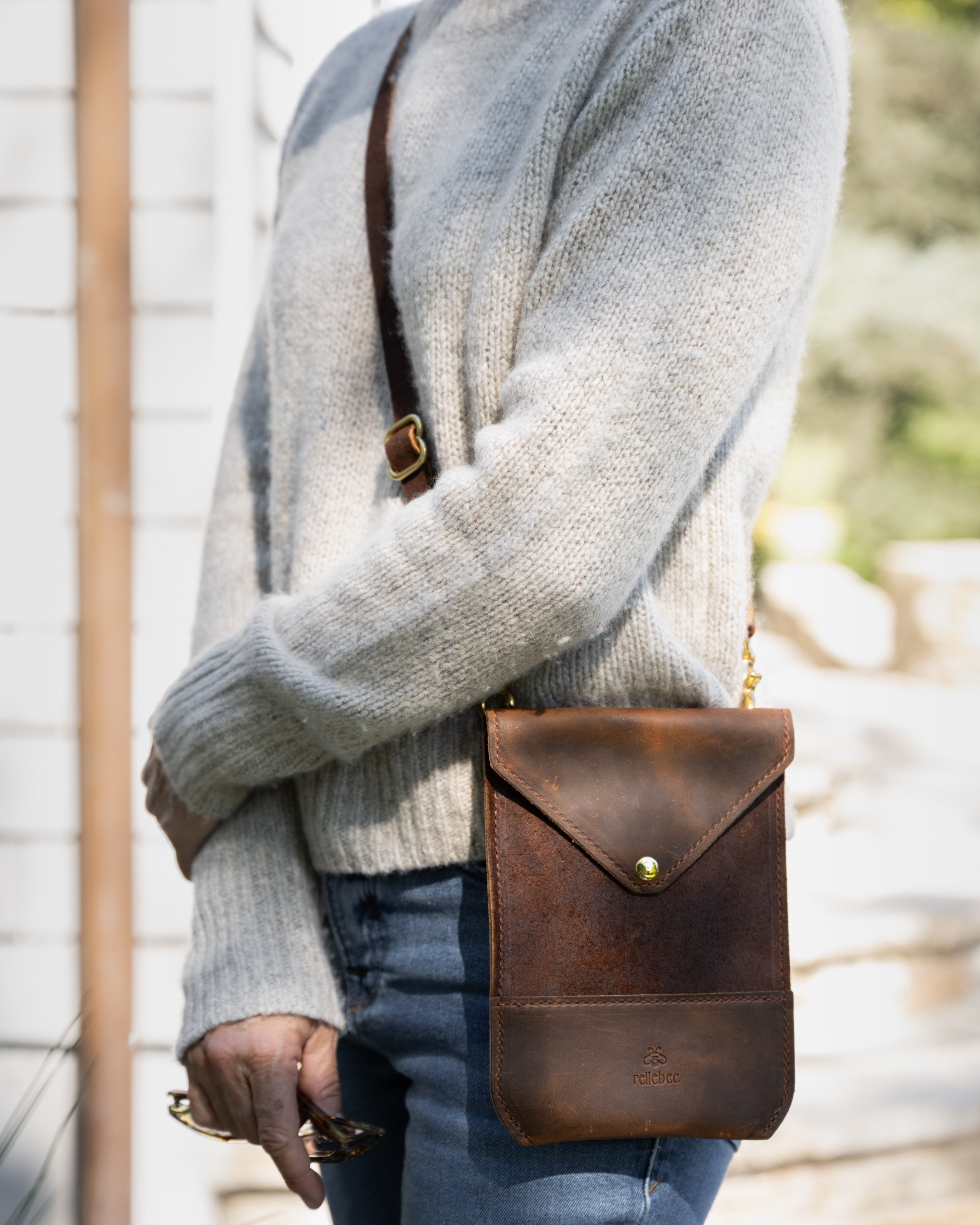 Image of model wearing the envelope sling