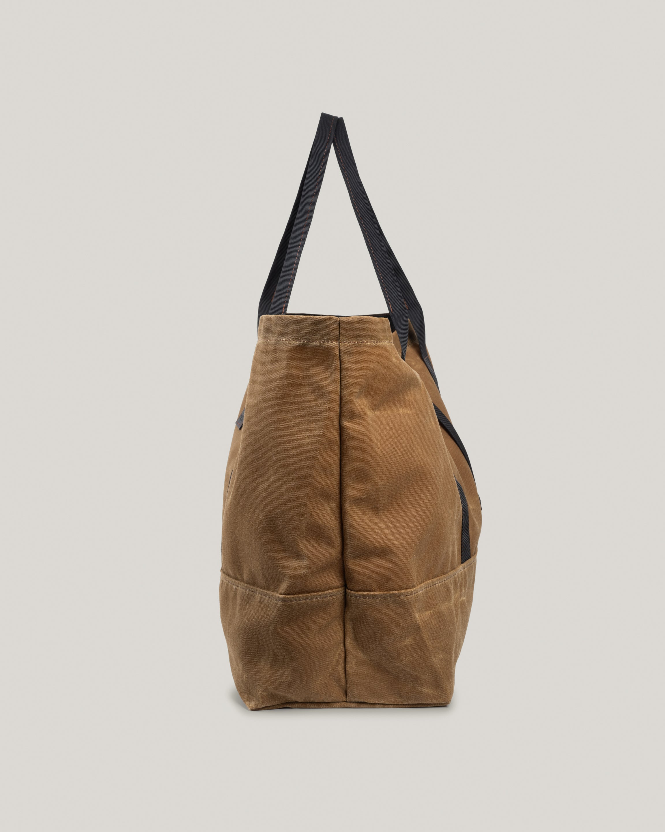 Side view image of the Utility Tote in umber waxed