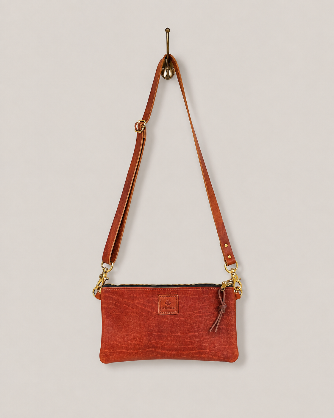 rellebee crossbody leather bag in saddle brown